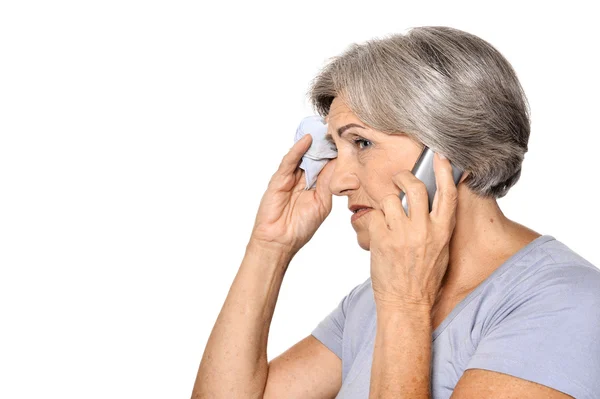 Sick elderly woman callin on phone — Stock Photo, Image