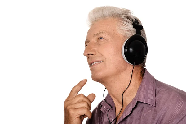 Hombre mayor en auriculares — Foto de Stock