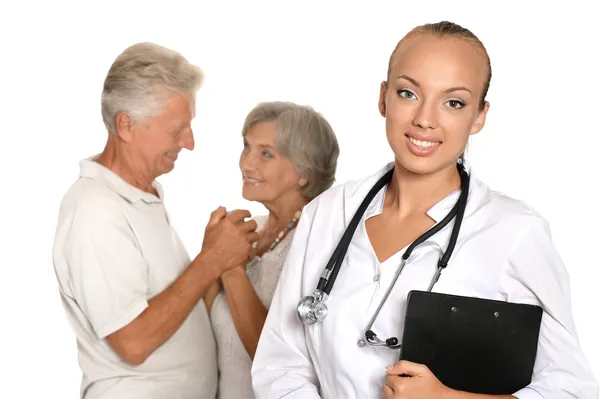 Pacientes ancianos pareja vino a visitar a un médico joven — Foto de Stock