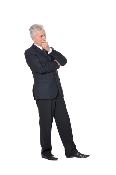 Thoughtful elderly man in suit — Stock Photo, Image