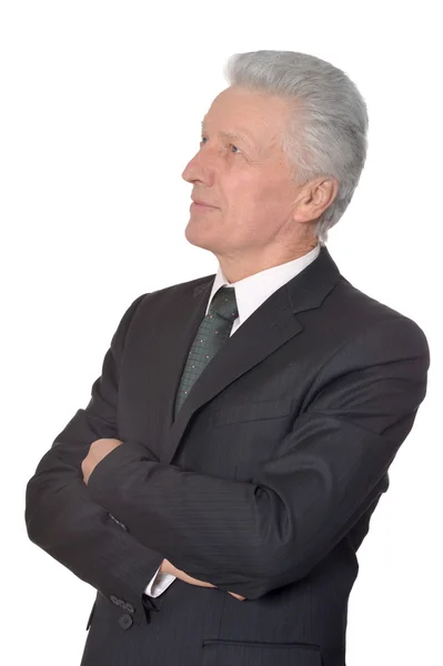 Thoughtful elderly man in suit — Stock Photo, Image