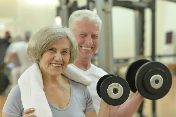 Elderly couple in a gym Royalty Free Stock Images