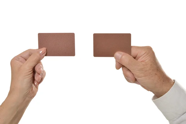 Two hands holding empty blank cards — 图库照片