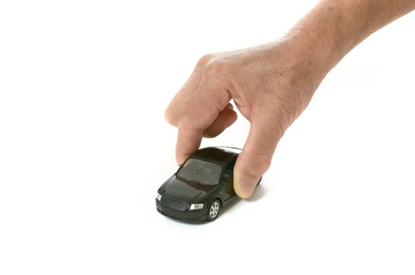 Hand with miniature car — Stock Photo, Image