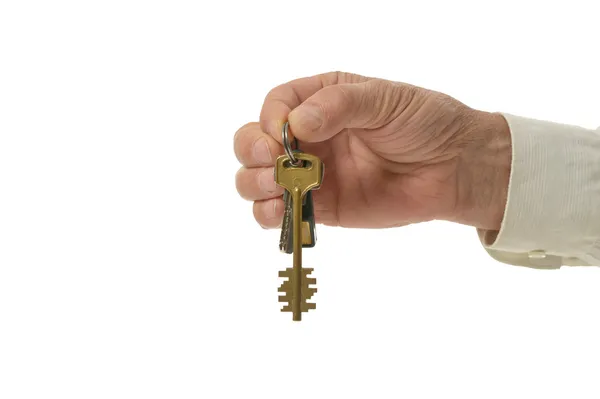 Mand hånd med nøgler - Stock-foto