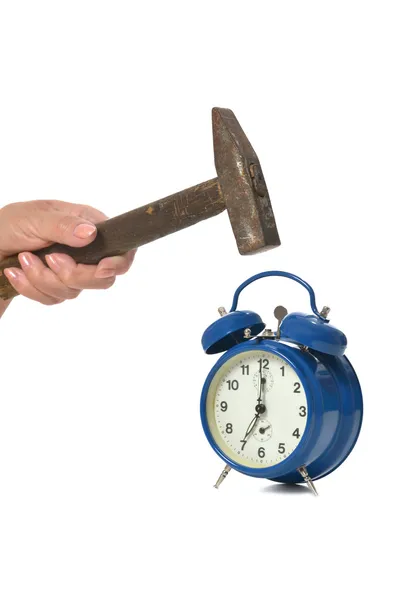 Hammer hits alarm clock — Stock Photo, Image