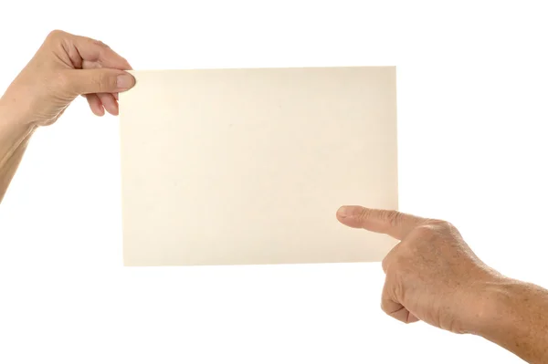 Mani con carta bianca — Foto Stock