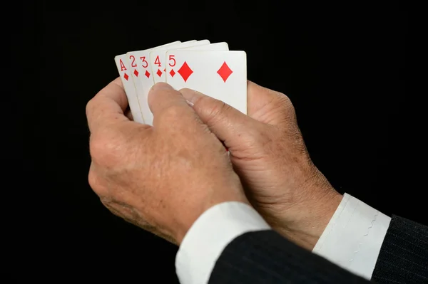 Hands with playing cards — Stock Photo, Image