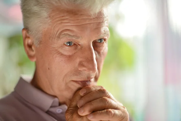 Thoughtful elderly man — Stock Photo, Image