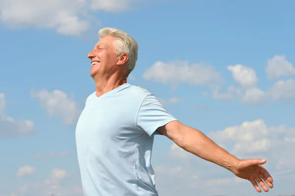 Old man and sky — Stock Photo, Image