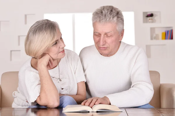 Lovely elderly couple resting at home — Stock Photo, Image