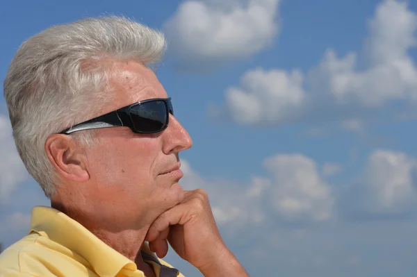 Old man and sky — Stock Photo, Image