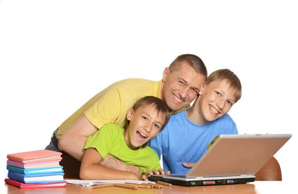 Boys doing homework with father — Stock Photo, Image