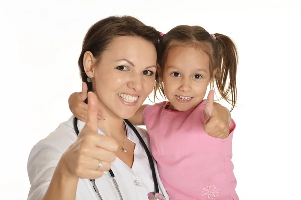 Cute little girl at doctor Stock Photo