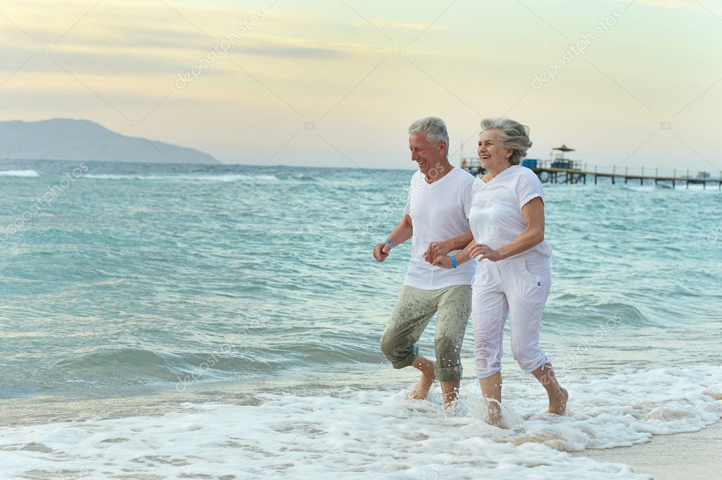 Older Couple On Beach Older Couple On Beach
