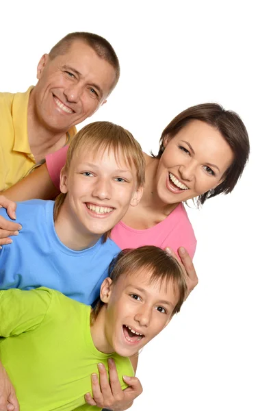 Família atraente em camisetas brilhantes — Fotografia de Stock