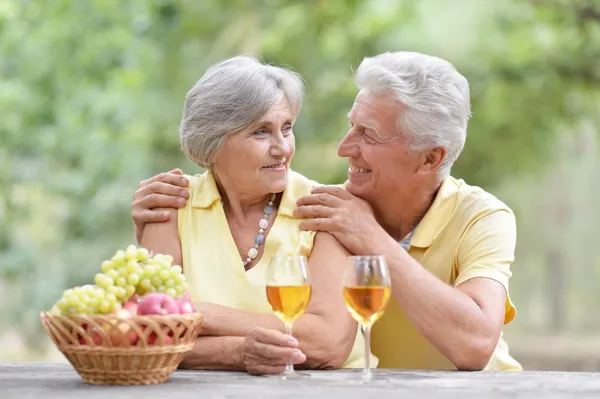 Elderly couple on nature — Stock Photo, Image