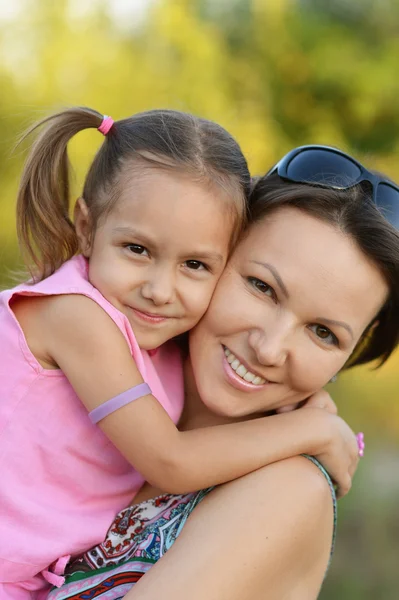 Little girl with her mother on a walk — Stock Photo, Image