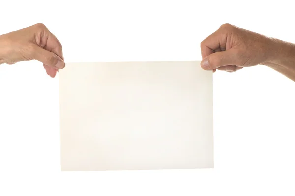 Mãos segurando papel em branco — Fotografia de Stock