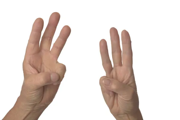 Ruce ukazují tři — Stock fotografie