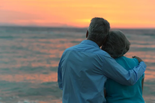 Senior couple looking a sea — Stock Photo, Image