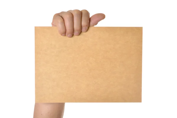 Ręce trzymając papier blank — Zdjęcie stockowe