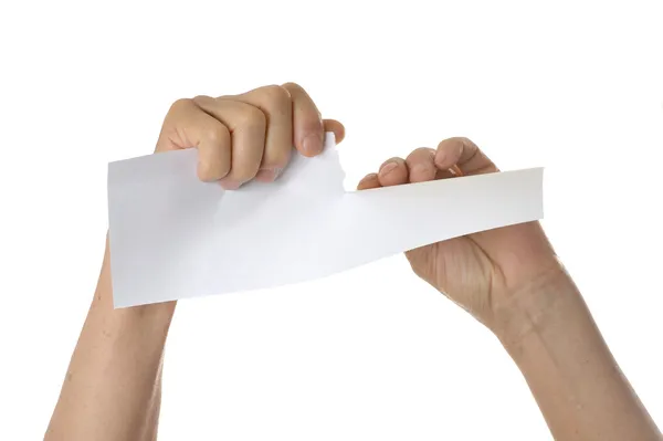 Manos rasgando hoja de papel — Foto de Stock