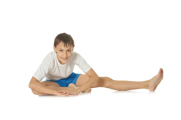 Boy exercising yoga — Stock Photo, Image
