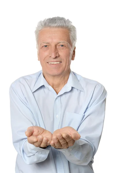 Senior man giving — Stock Photo, Image
