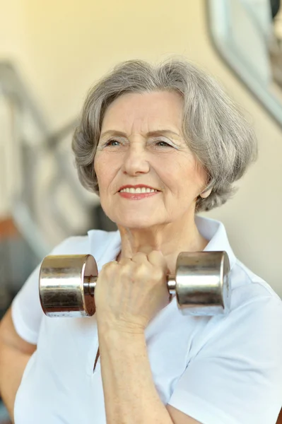 Lady with dumbbell — Stock Photo, Image