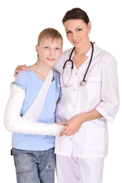 Médica e jovem rapaz — Fotografia de Stock