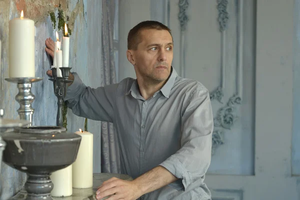 Thoughtful man in vintage interior — Stock Photo, Image