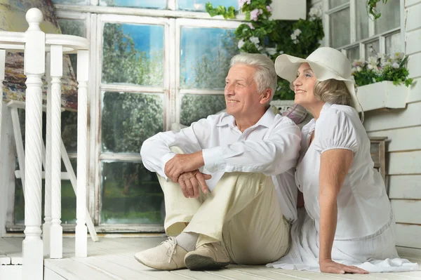 Elderly couple on veranda — Stock Photo, Image