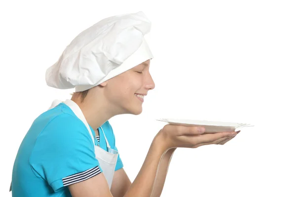 Kitchen boy holds plate — Stock Photo, Image