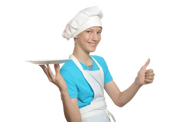 Keuken jongen met lege plaat — Stockfoto