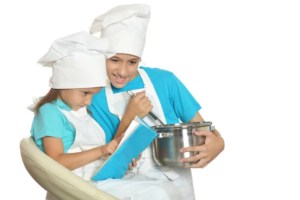 Brother and sister cooking — Stock Photo, Image