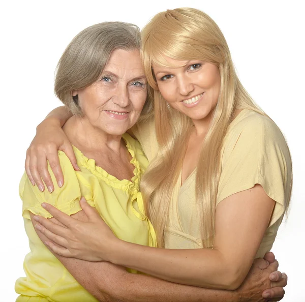 Embracing mom and daughter — Stock Photo, Image