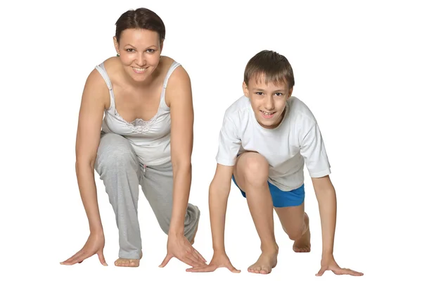 Young mother and son exercising — Stock Photo, Image