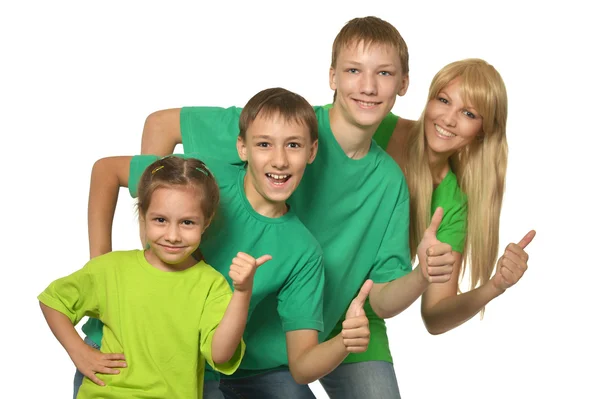 Família em uma roupa verde — Fotografia de Stock