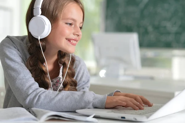 Schoolgirl Headphones Doing Home Work Laptop Room — Stock Photo, Image