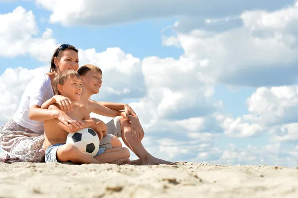 Happy family with soccer ball — Stock Photo, Image