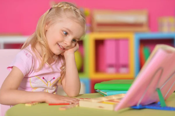 Little Cute Girl Studying Table Home — Stockfoto