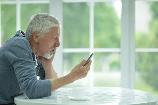 Senior Man Using Phone Home — Stock Photo, Image