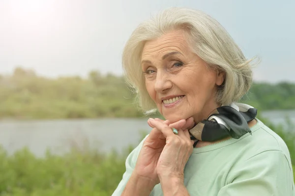 Happy Smiling Senior Woman Posing Outdoors — Stock Photo, Image