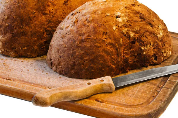 Knife and a loaf bread — Stock Photo, Image