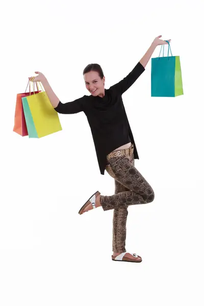 Joven hermosa mujer con bolsas de compras — Foto de Stock