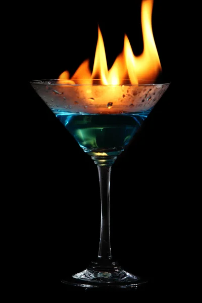 Martini glass with alcohol and fire — Stock Photo, Image