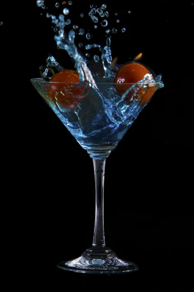 Martini glass with water splash — Stock Photo, Image