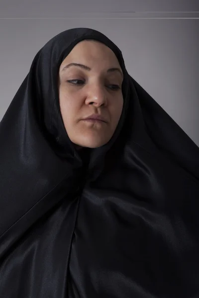 Woman covered with black veil — Stock Photo, Image