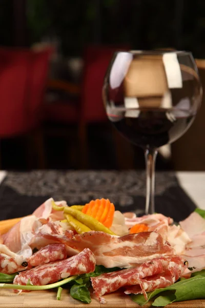 Mixed cold cuts with wine — Stock Photo, Image